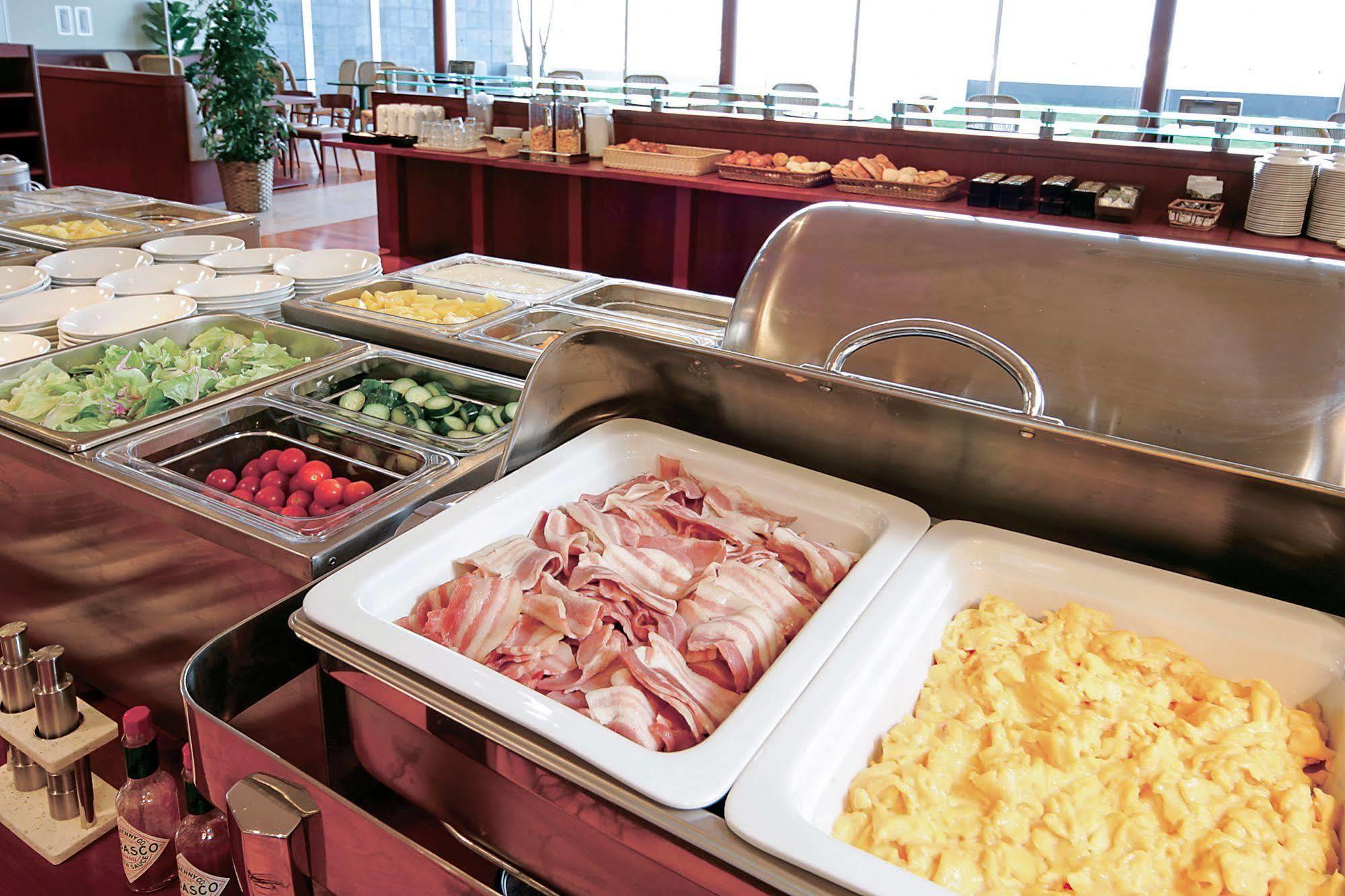 Comfort Hotel Central International Airport Тюбу Экстерьер фото